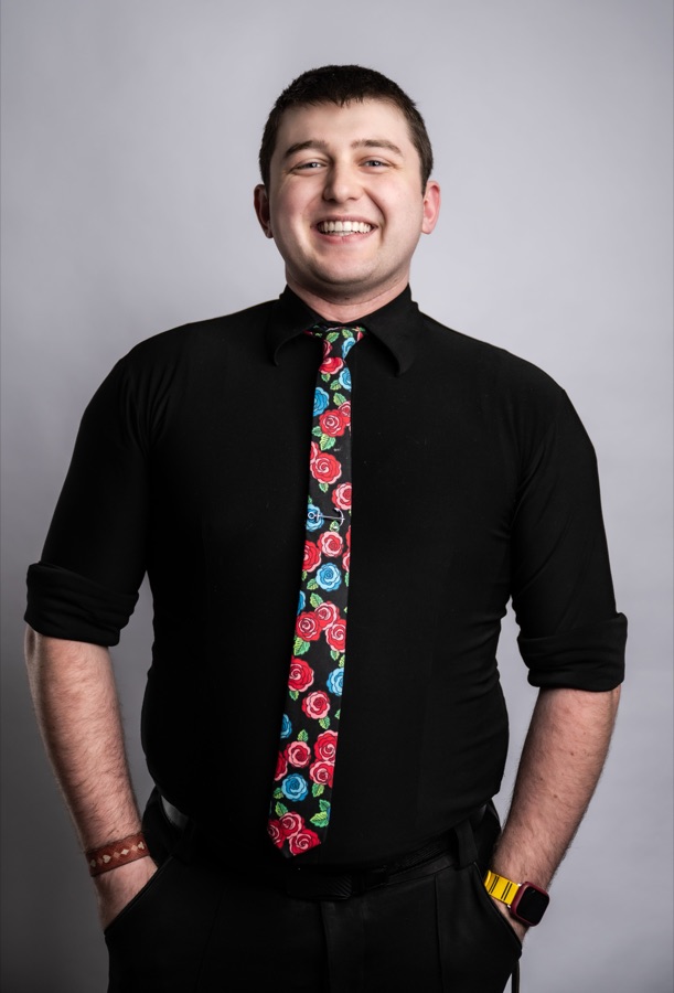 Dexter Ellis, head coach and founder of Atlas Dance, in professional dance attire